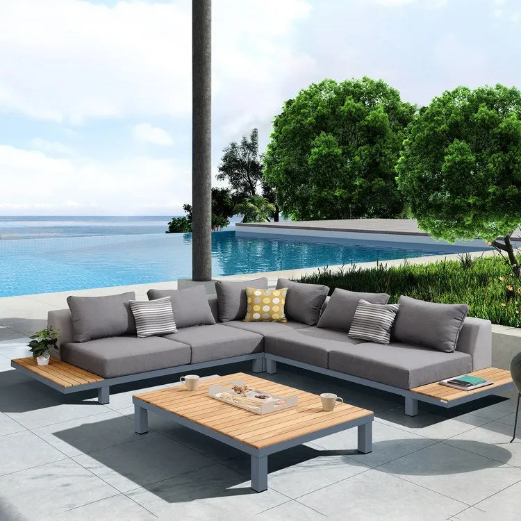 Polo Four-Piece Outdoor Sectional Set with Dark Gray Cushions and Modern Accent Pillows