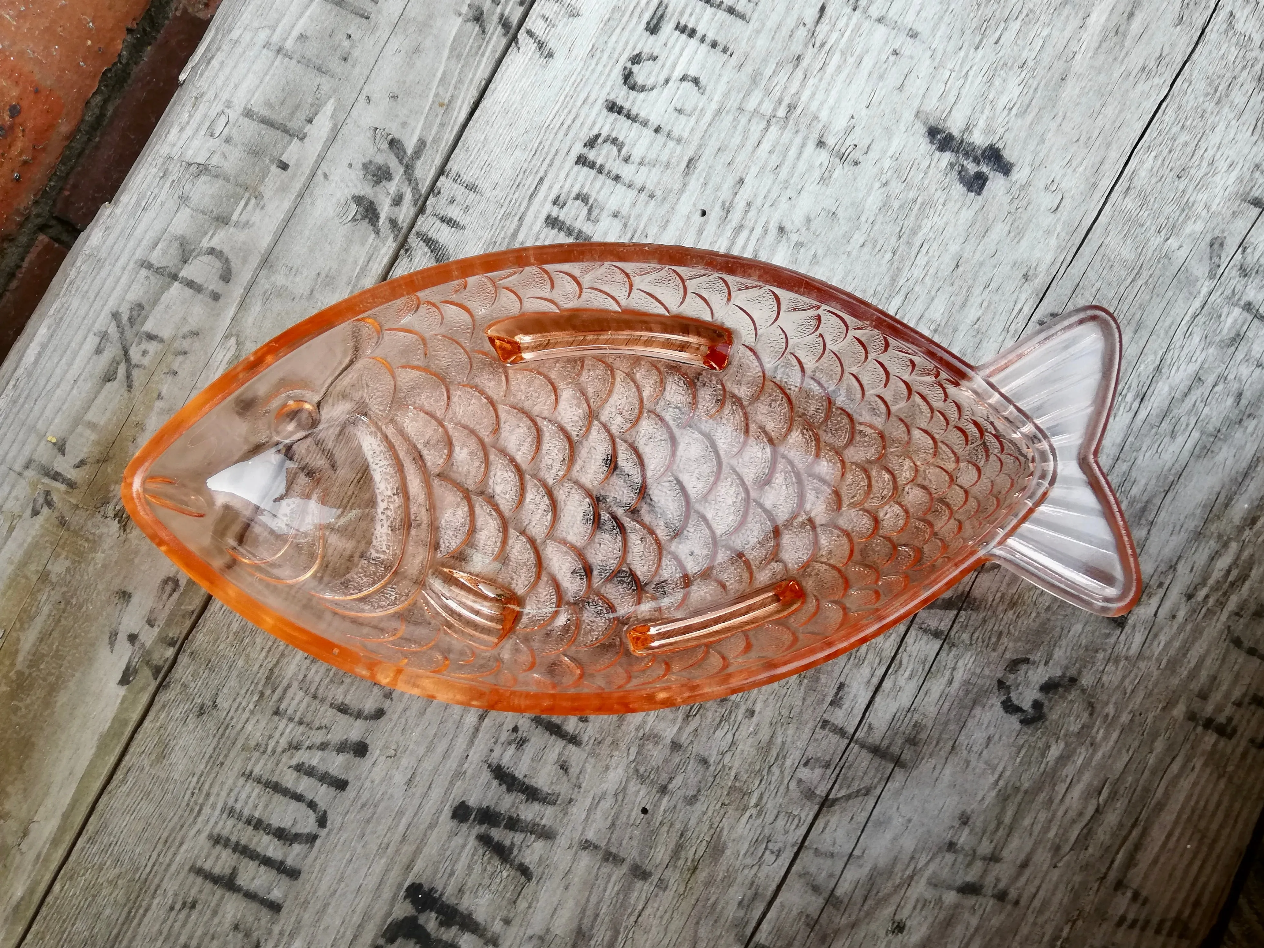 Vintage clear pink pressed glass dish in the shape of